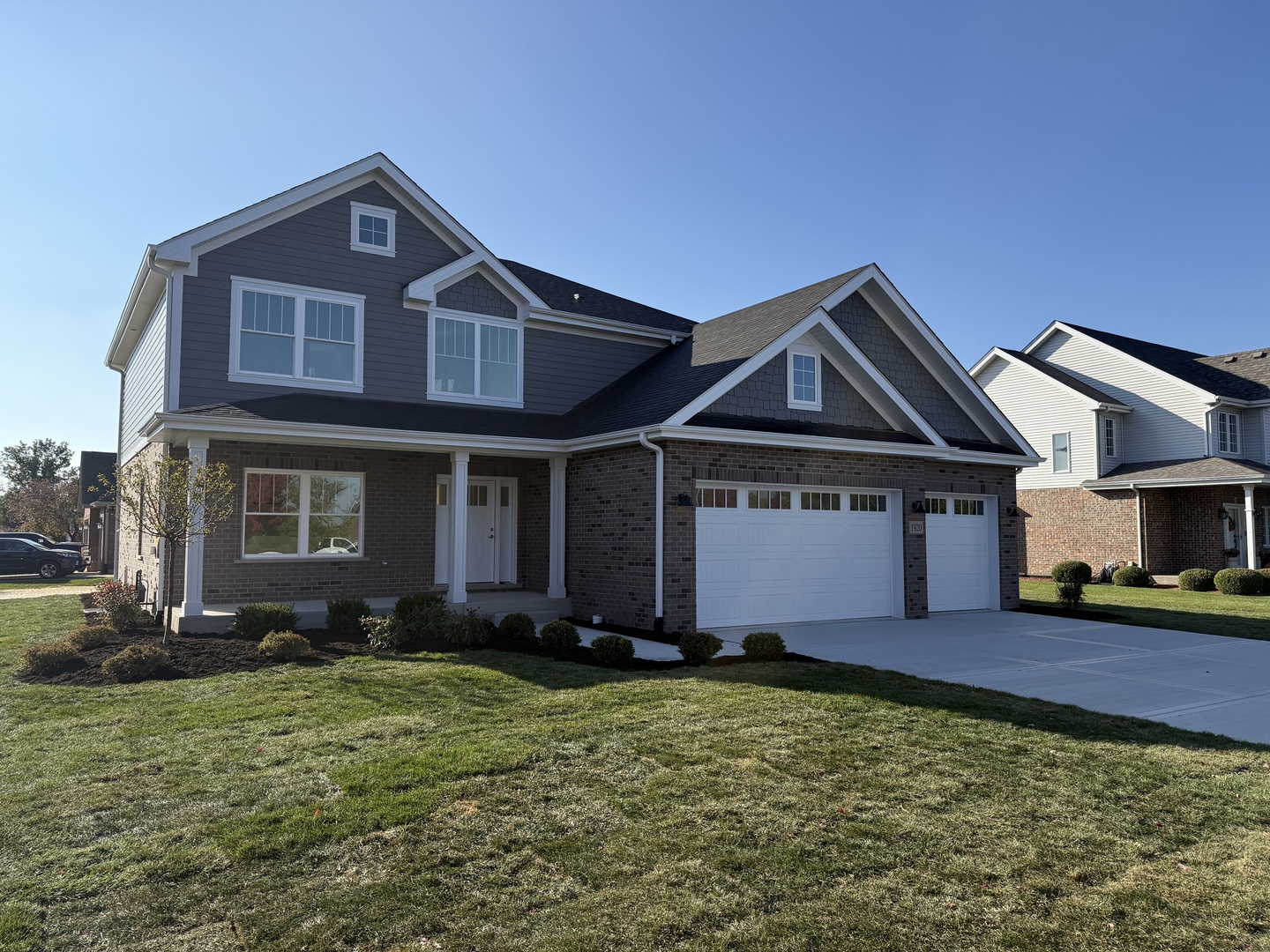 1920 Edmonds Avenue New Lenox, IL 60451 - Photo 2 of 35 a front view of a house with a yard