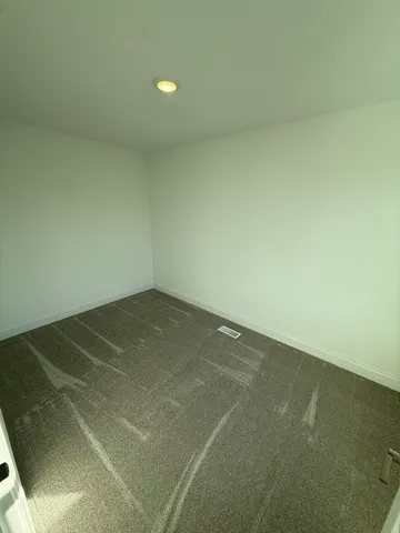 an empty room with a workbench