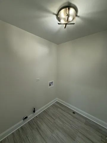 a view of entryway and kitchen