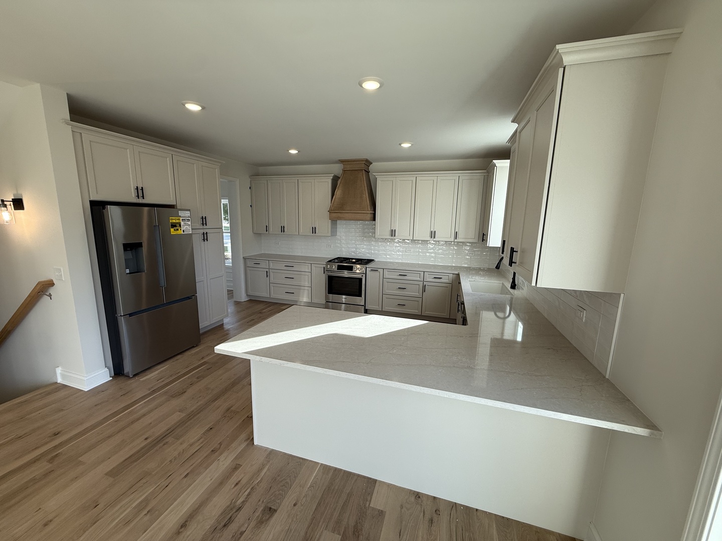 1920 Edmonds Avenue New Lenox, IL 60451 - Photo 10 of 35 a large kitchen with stainless steel appliances granite countertop a refrigerator a stove a sink and a refrigerator