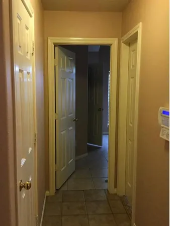 a bathroom with a shower and a sink