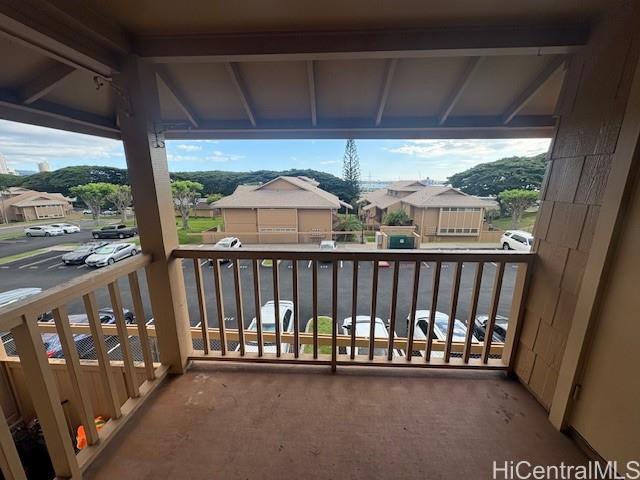 98-1370 Koaheahe Place, Unit 164 Pearl City, HI 96782 - Photo 7 of 12 a view of a porch with a floor to ceiling window