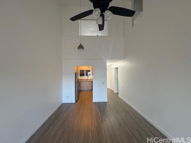 98-1370 Koaheahe Place, Unit 164 Pearl City, HI 96782 - Photo 8 of 12 a view of a hallway with wooden floor