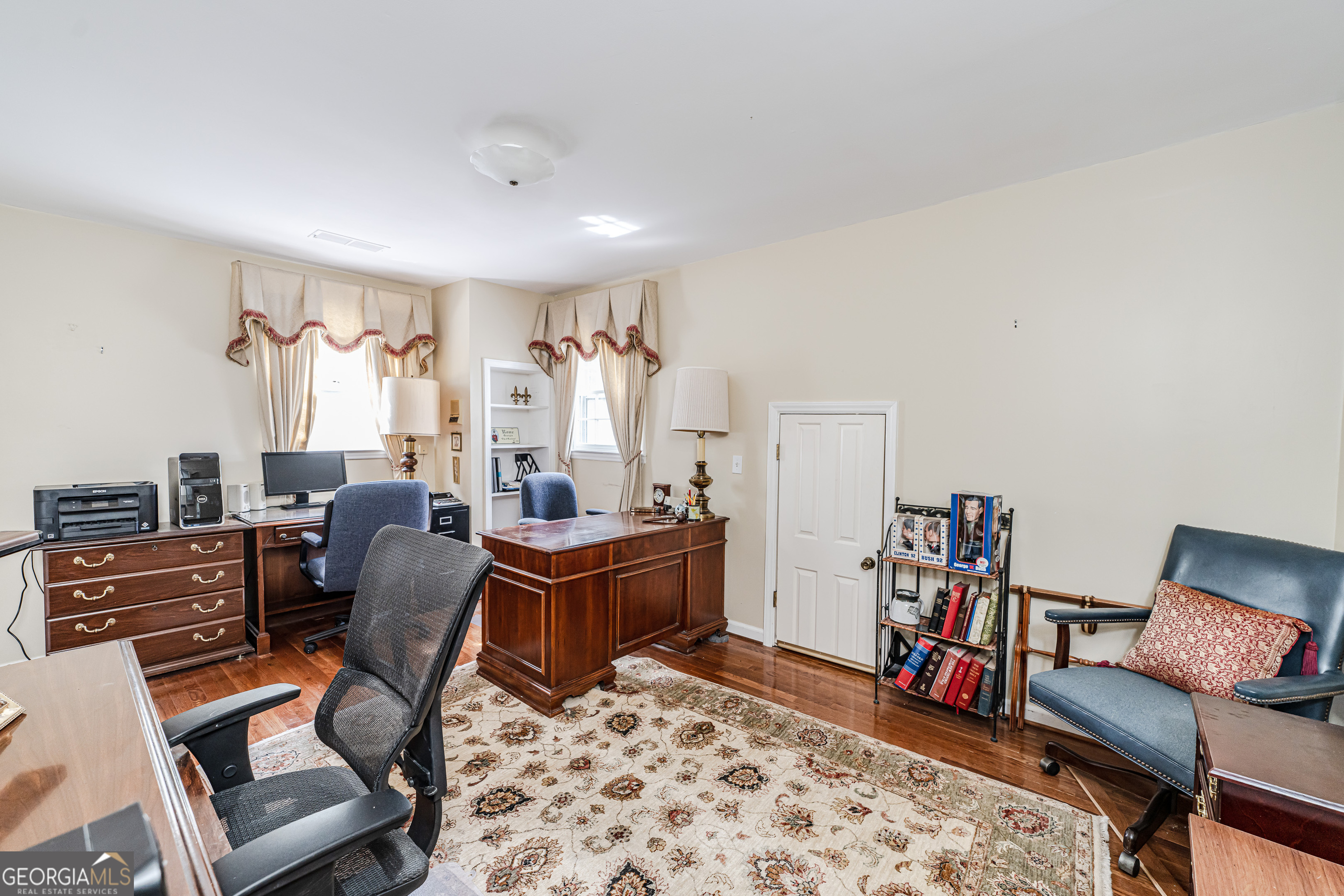 4 Windemere Lane Southeast Rome, GA 30161 - Photo 33 of 60 a view of a workspace with furniture and a livingroom