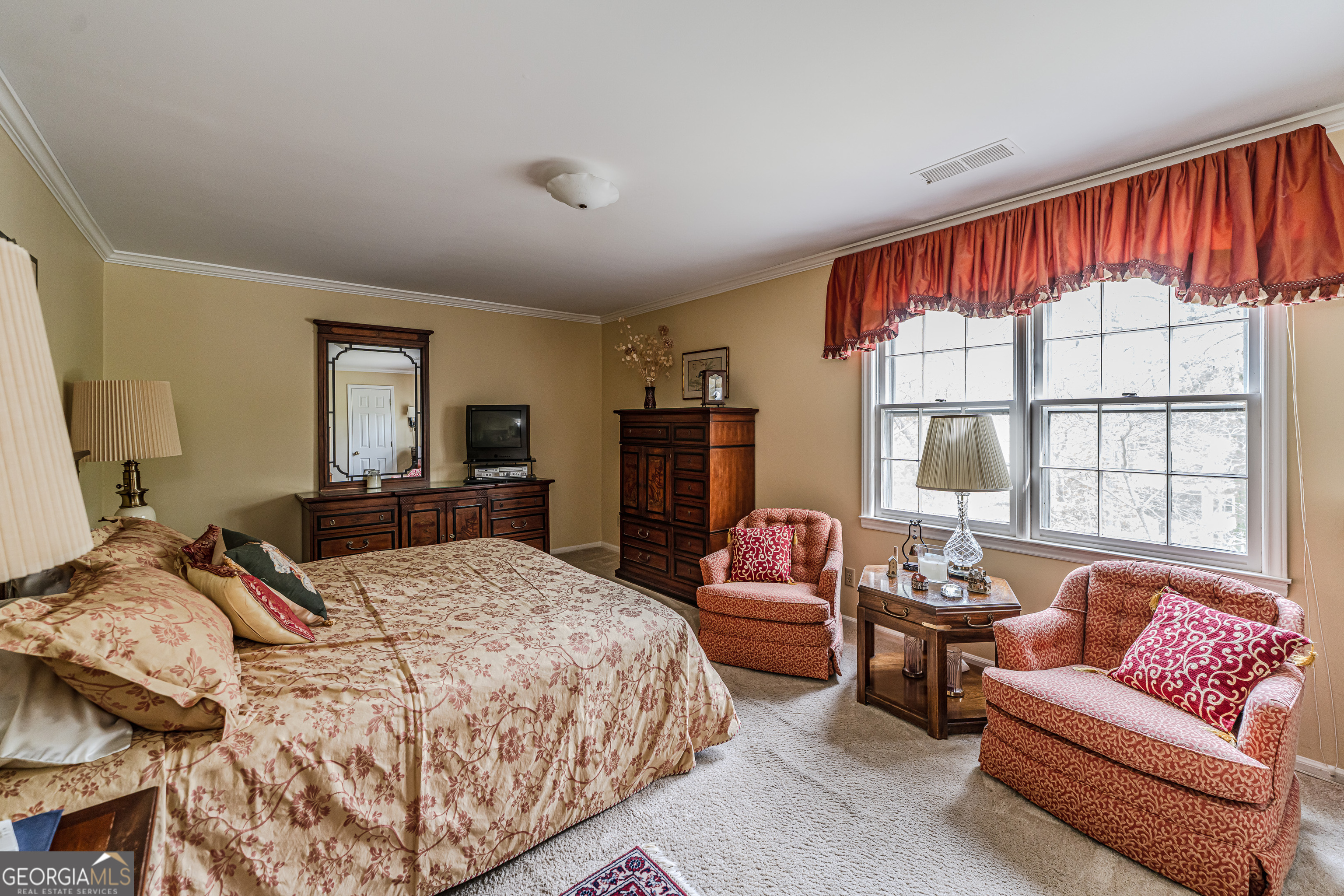 4 Windemere Lane Southeast Rome, GA 30161 - Photo 34 of 60 a bedroom with a bed couch and a window