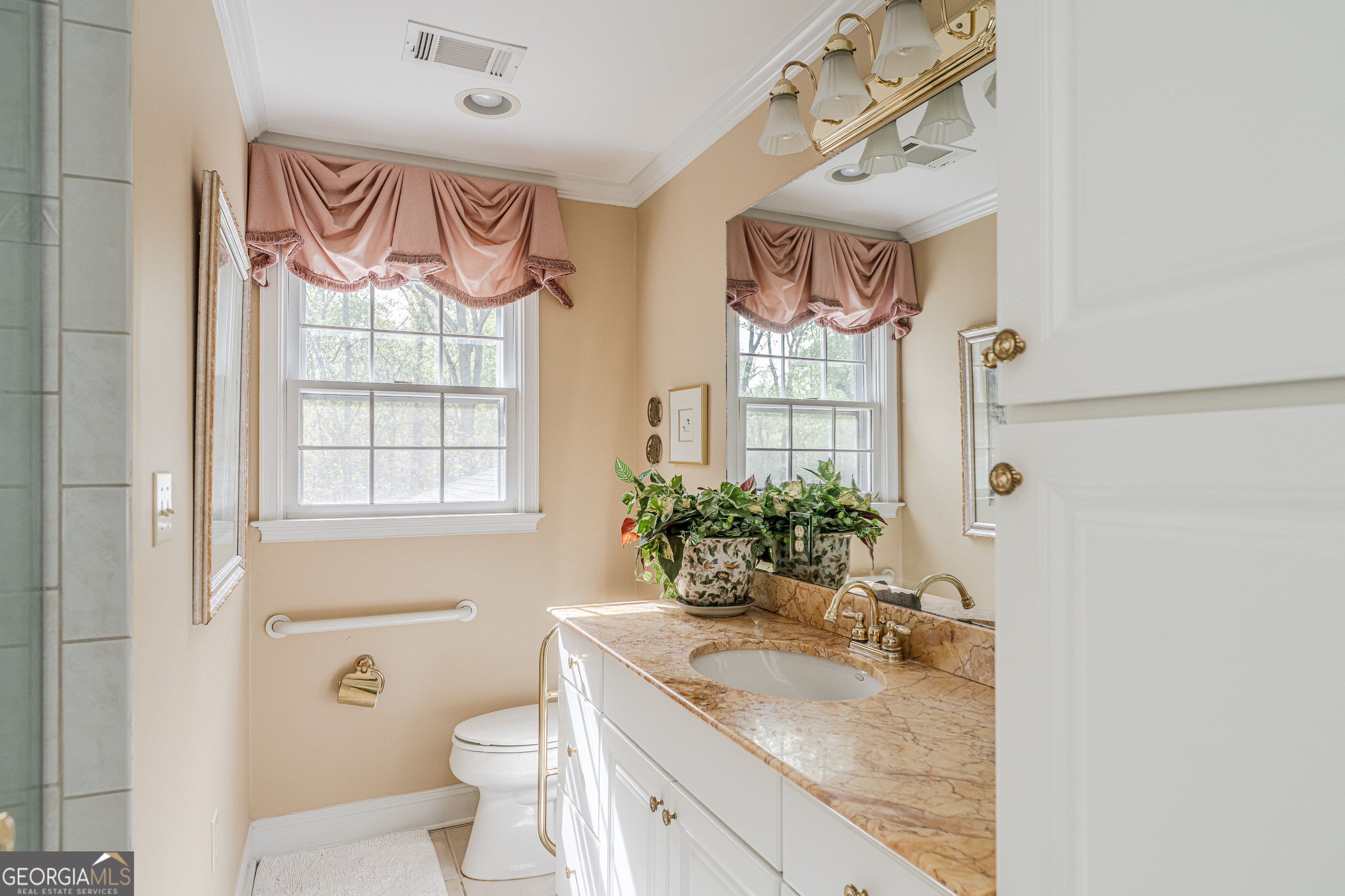 4 Windemere Lane Southeast Rome, GA 30161 - Photo 36 of 60 a bathroom with a granite countertop sink and a mirror