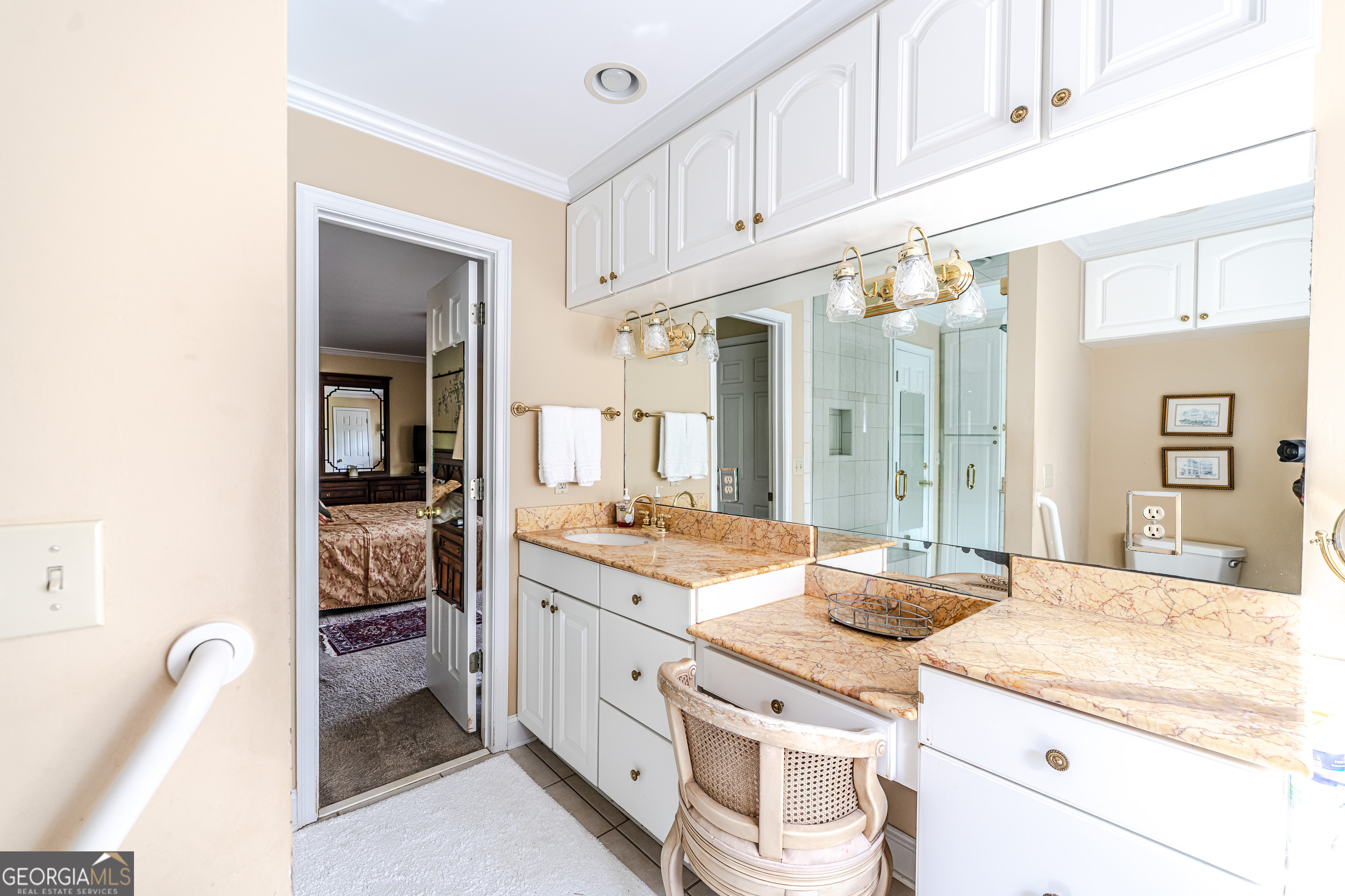 4 Windemere Lane Southeast Rome, GA 30161 - Photo 41 of 60 a spacious bathroom with a granite countertop sink and a mirror