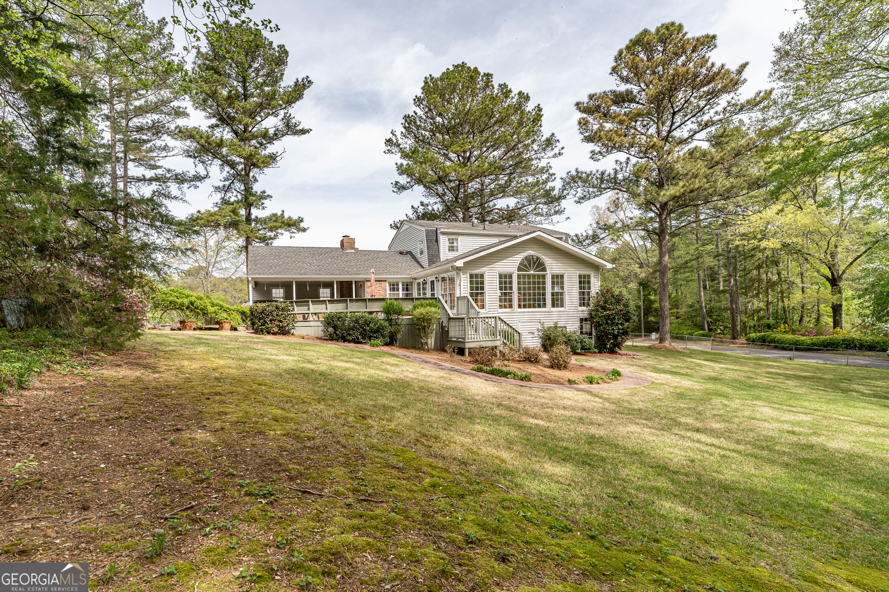 4 Windemere Lane Southeast Rome, GA 30161 - Photo 50 of 60 a front view of a house with a garden