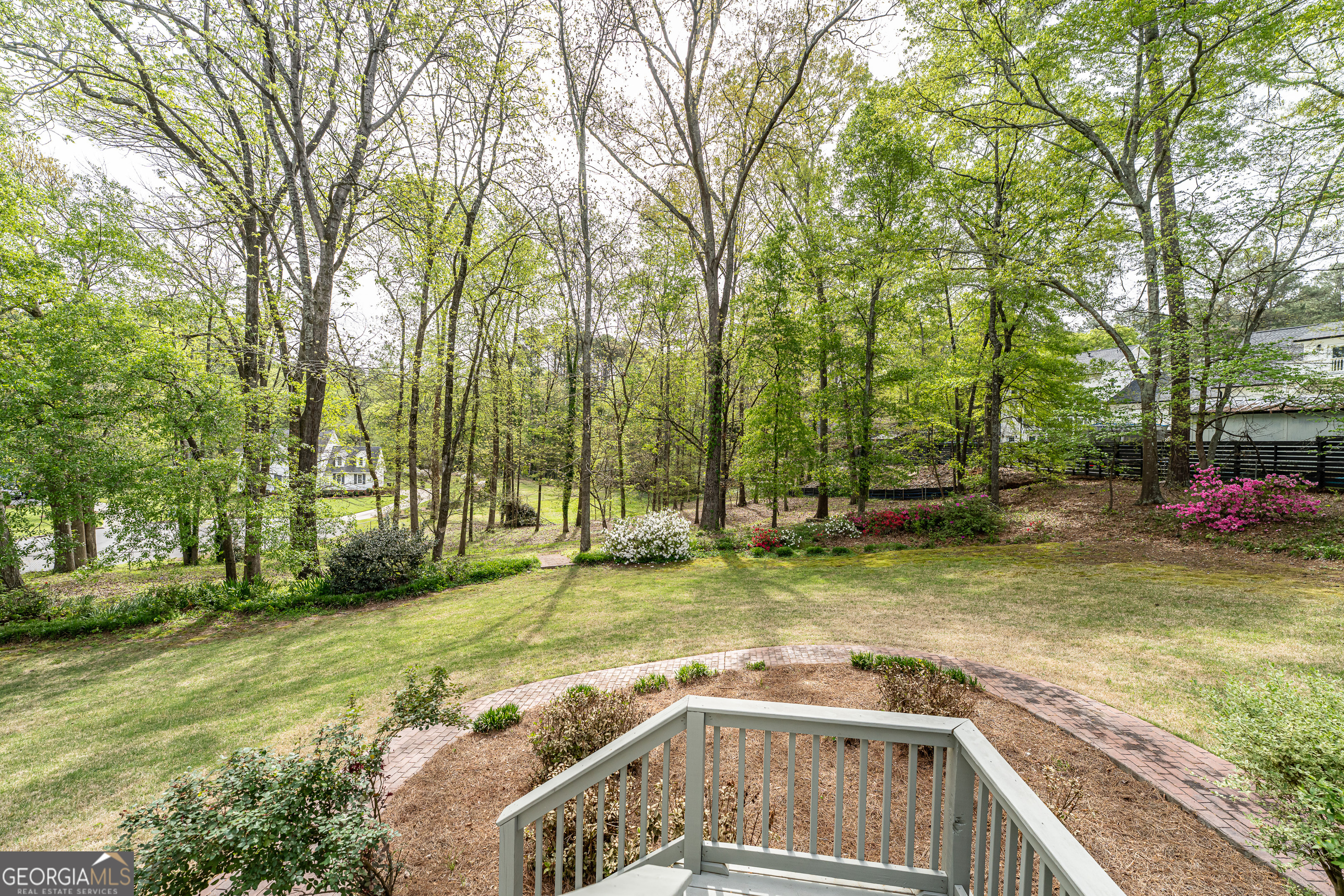 4 Windemere Lane Southeast Rome, GA 30161 - Photo 57 of 60 a view of a house with pool and trees in the background
