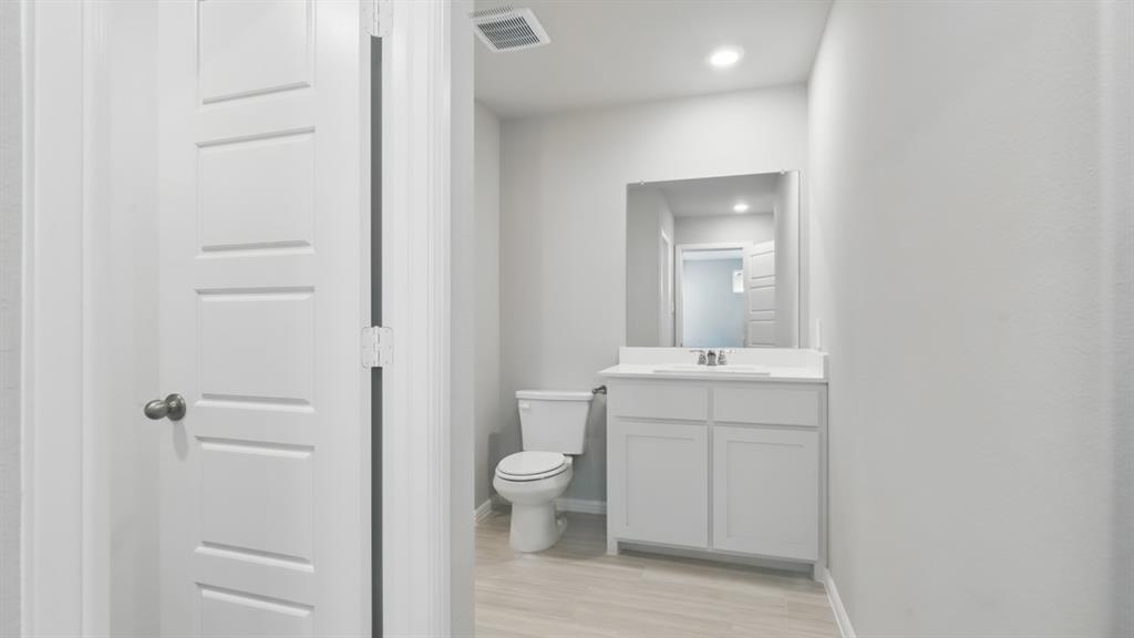 3152 Maple Orch Lane Fort Worth, TX 76140 - Photo 22 of 37 a bathroom with a sink a toilet and shower