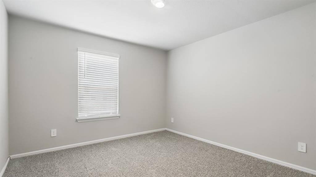 3152 Maple Orch Lane Fort Worth, TX 76140 - Photo 26 of 37 an empty room with a window