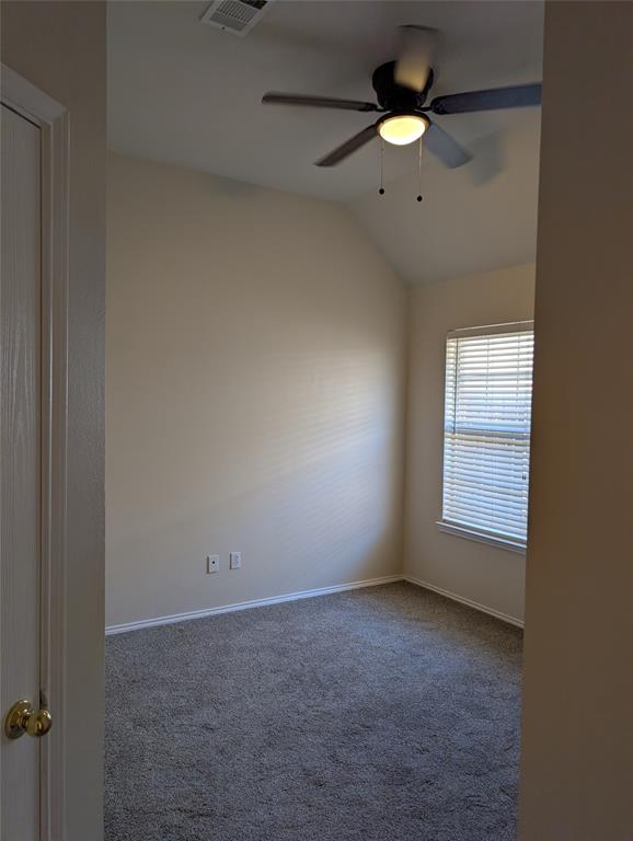 5013 Geranium Court McKinney, TX 75070 - Photo 7 of 11 an empty room with a window and a fan