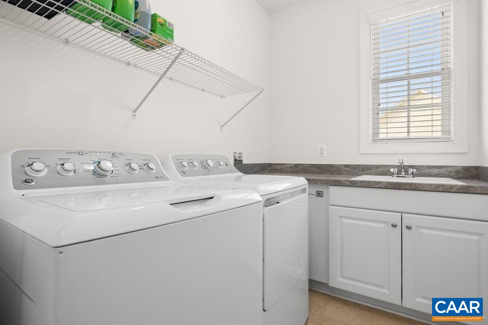 89 Crape Myrtle Drive Palmyra, VA 22963 - Photo 23 of 36 a utility room with dryer and washer