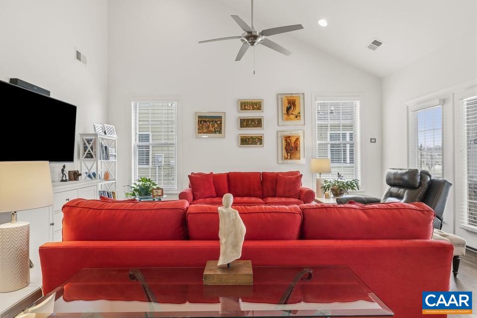89 Crape Myrtle Drive Palmyra, VA 22963 - Photo 10 of 36 a living room with furniture and a flat screen tv