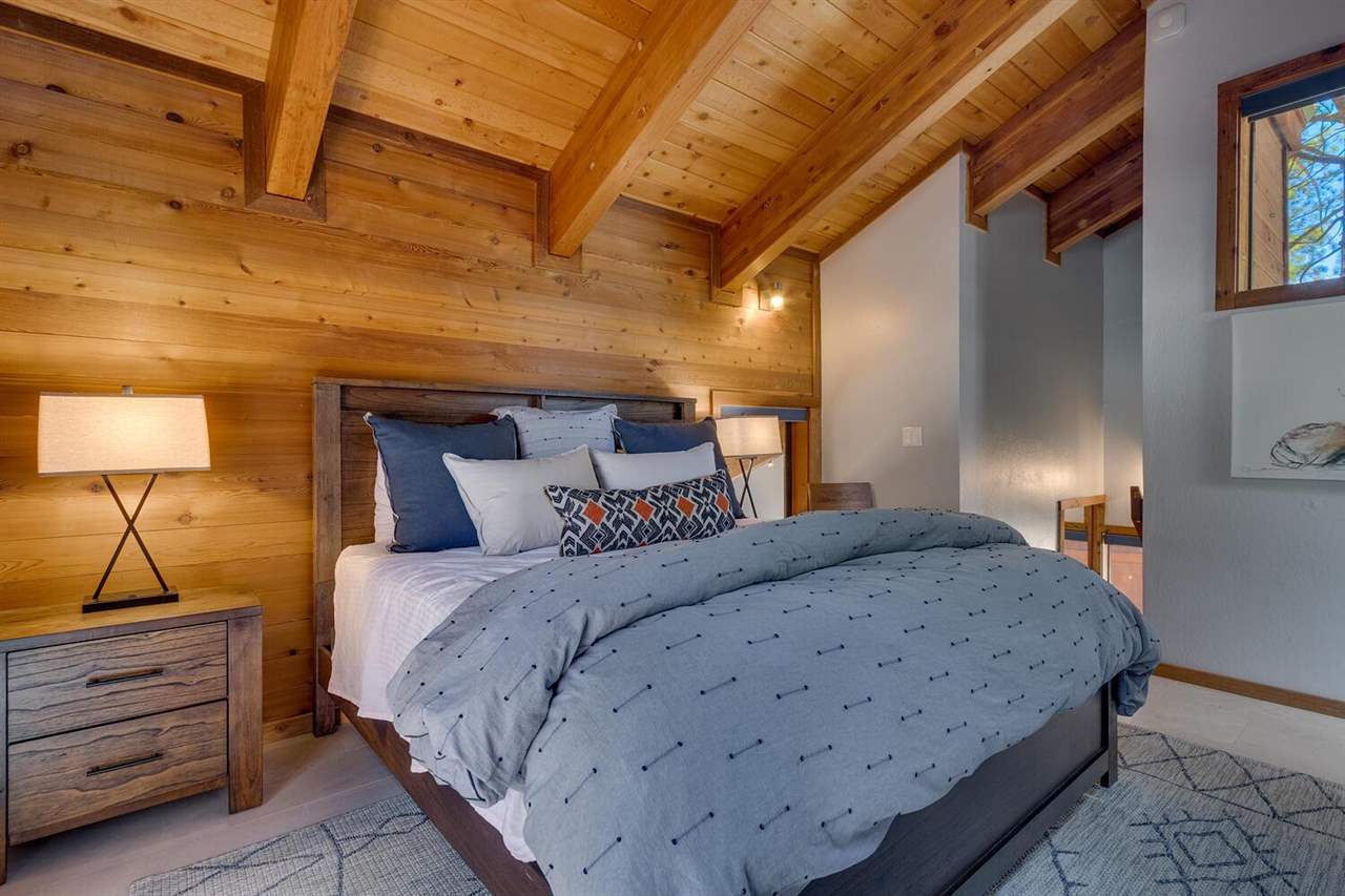117 Basque Drive Truckee, CA 96161 - Photo 14 of 20 a bedroom with a bed and a night stand