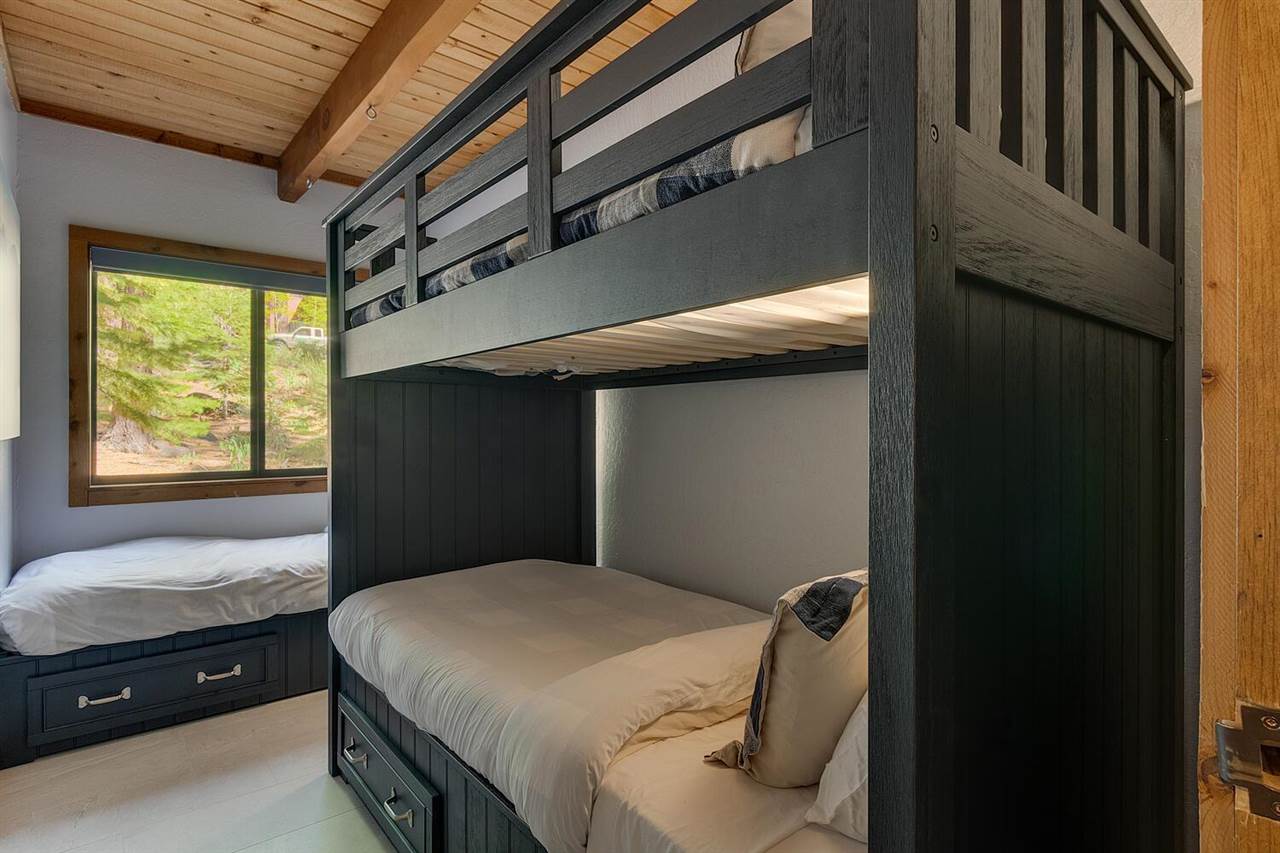 117 Basque Drive Truckee, CA 96161 - Photo 16 of 20 a bedroom with a bed and a window