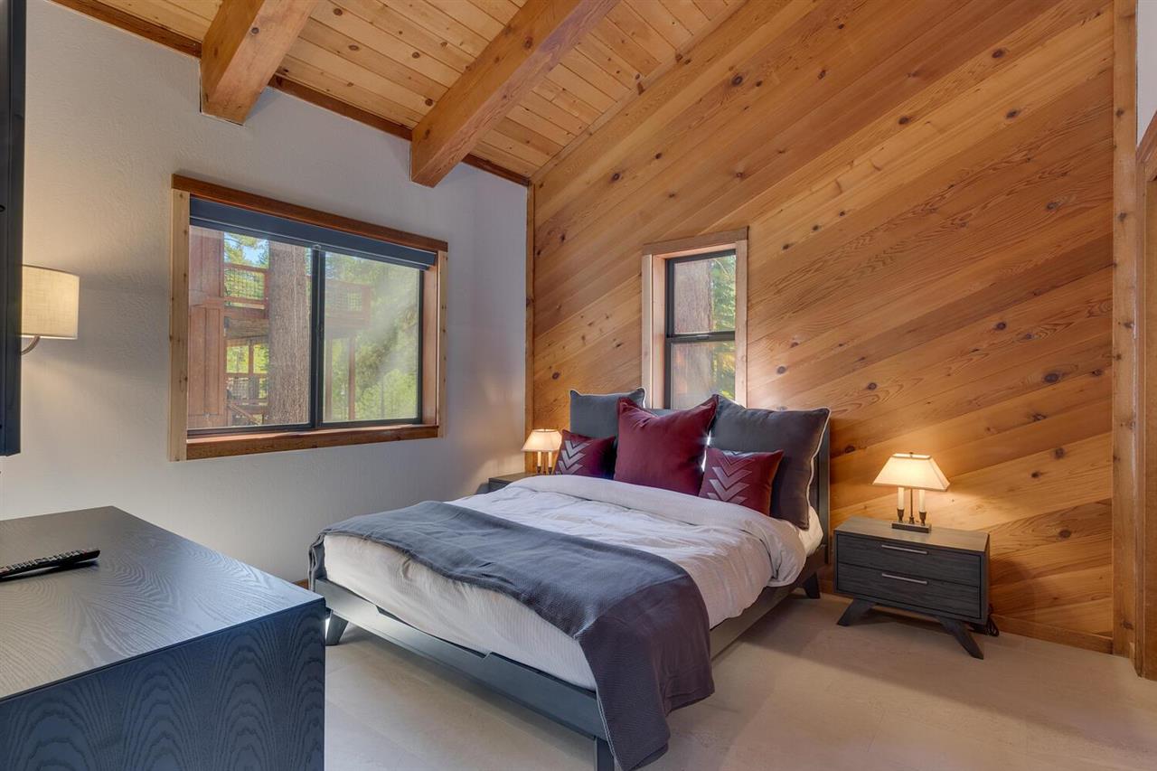 117 Basque Drive Truckee, CA 96161 - Photo 18 of 20 a bedroom with a bed and a desk