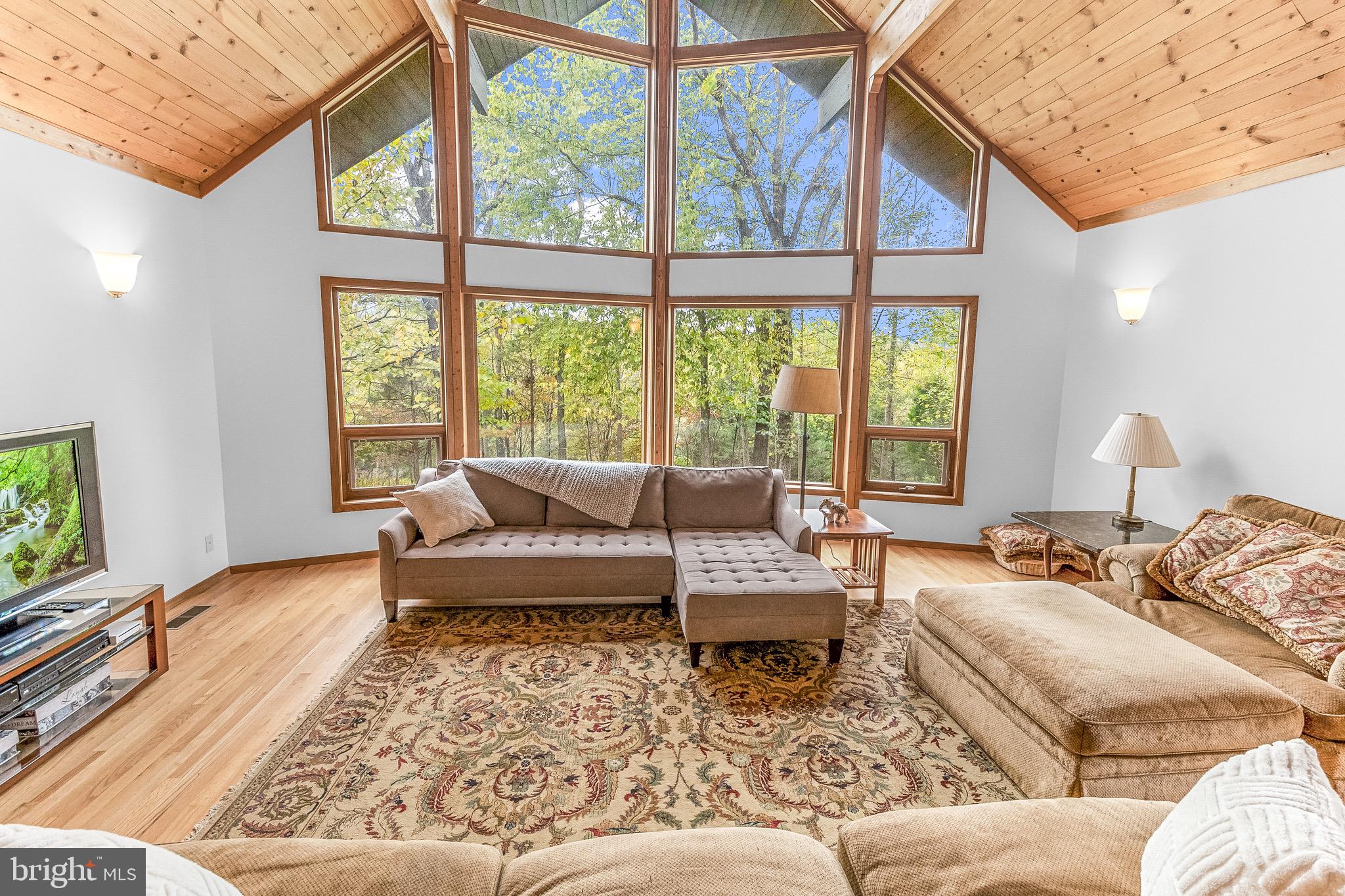 105 Rabbits Rest Lane Shepherdstown, WV 25443 - Photo 16 of 42 a living room with furniture and a large window
