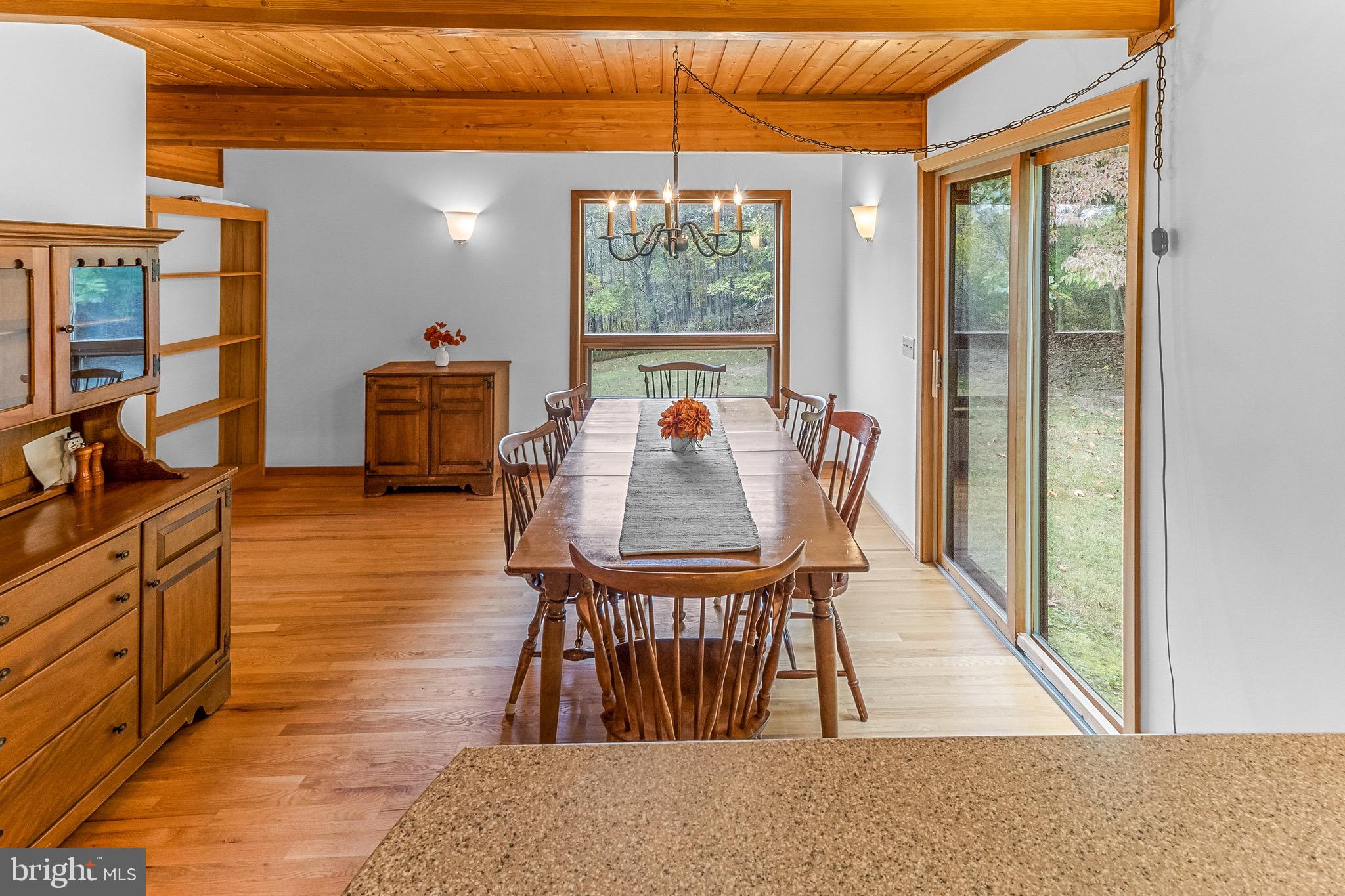 105 Rabbits Rest Lane Shepherdstown, WV 25443 - Photo 20 of 42 a living room with furniture a window and a table
