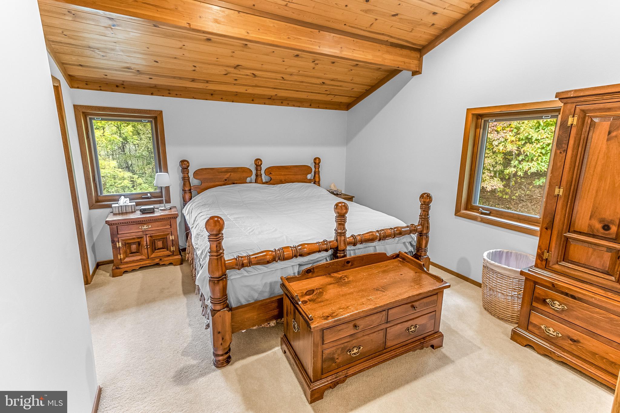 105 Rabbits Rest Lane Shepherdstown, WV 25443 - Photo 27 of 42 a bedroom with furniture and a window