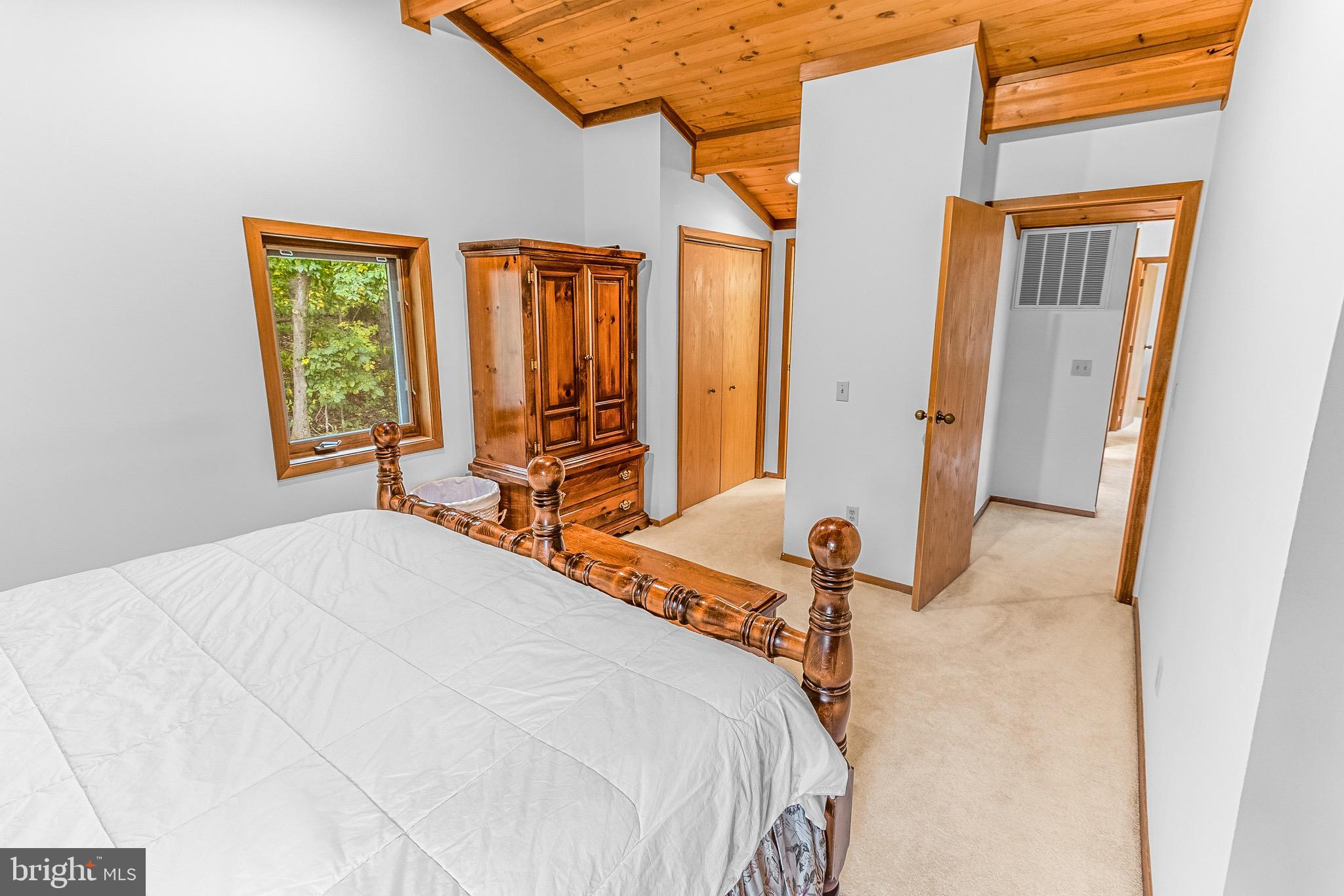 105 Rabbits Rest Lane Shepherdstown, WV 25443 - Photo 28 of 42 a bedroom with a bed and a window