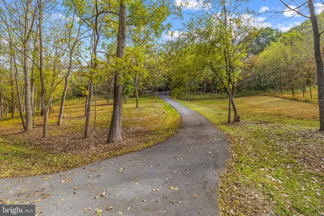 a view of mountain with lake view