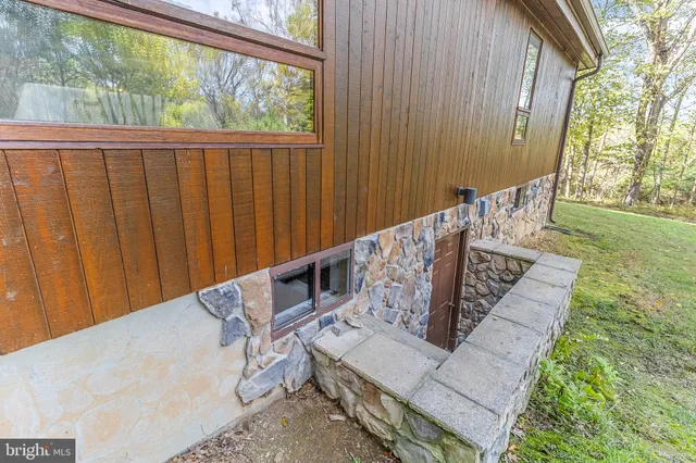 a view of balcony with wooden floor and outdoor space