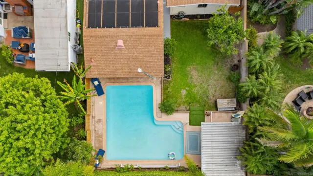 an aerial view of residential house with outdoor space