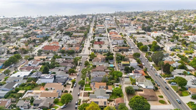 an aerial view of a city with lots of residential buildings