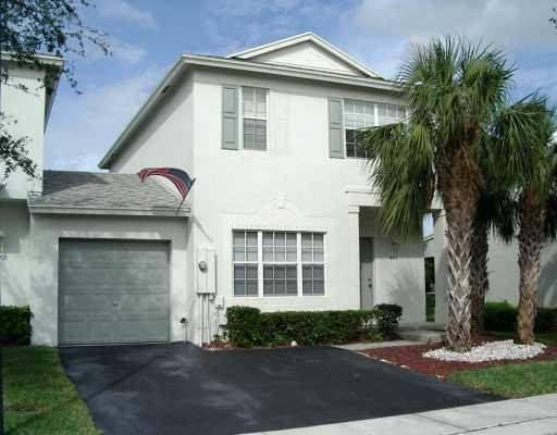 9711 Santa Rosa Drive Tamarac, FL 33321 - Photo 1 of 8 Exterior Front