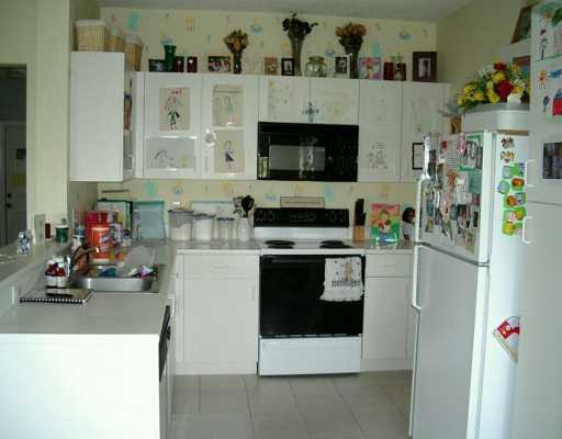 9711 Santa Rosa Drive Tamarac, FL 33321 - Photo 4 of 8 Kitchen
