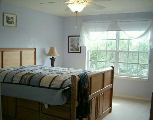 9711 Santa Rosa Drive Tamarac, FL 33321 - Photo 5 of 8 Master Bedroom