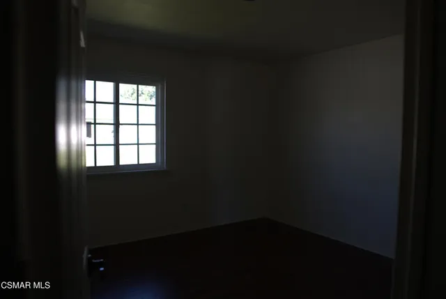 a view of a small space with a window