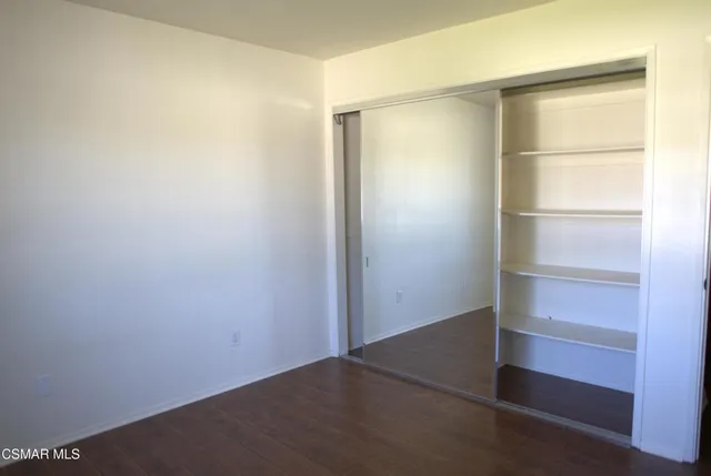 a view of an house with backyard space and garden