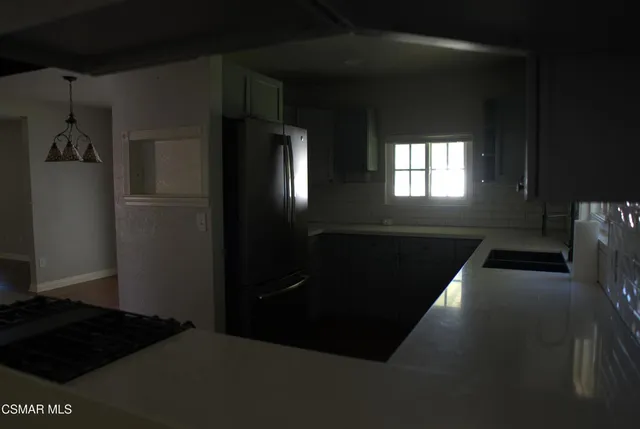 a view of a bathroom from a hallway