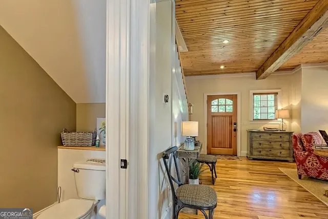 a view of a livingroom with furniture and windows