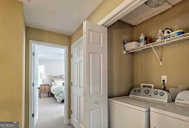 a utility room with dryer and washer