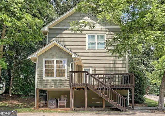 a front view of a house with a garage