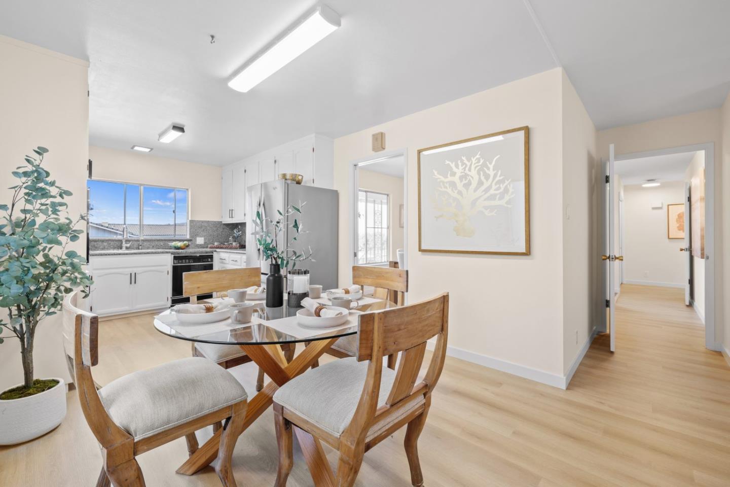 1250 Tuolumne Road Millbrae, CA 94030 - Photo 15 of 56 a view of a dining room with furniture and wooden floor