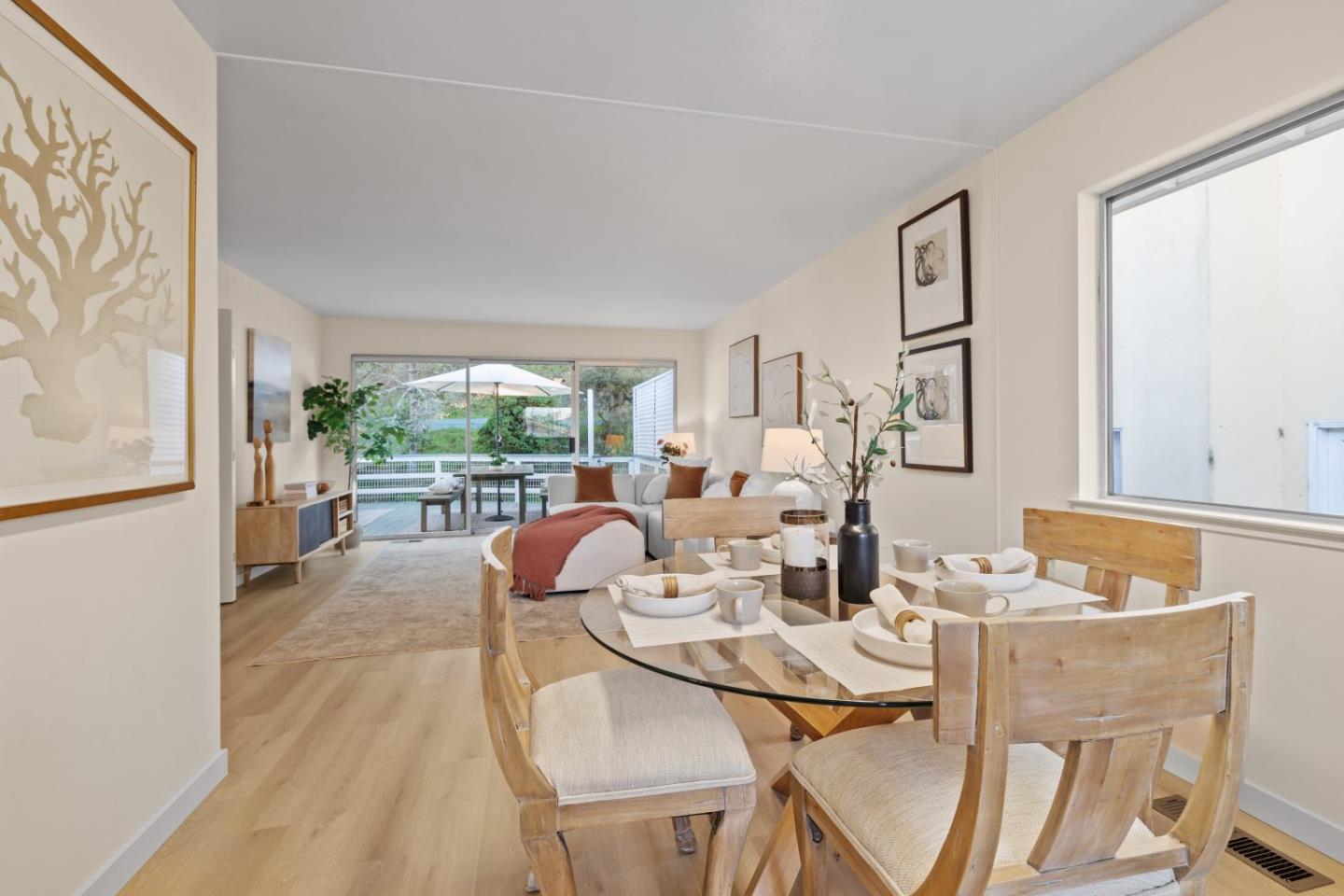 1250 Tuolumne Road Millbrae, CA 94030 - Photo 16 of 56 a dining room with furniture and a floor to ceiling window
