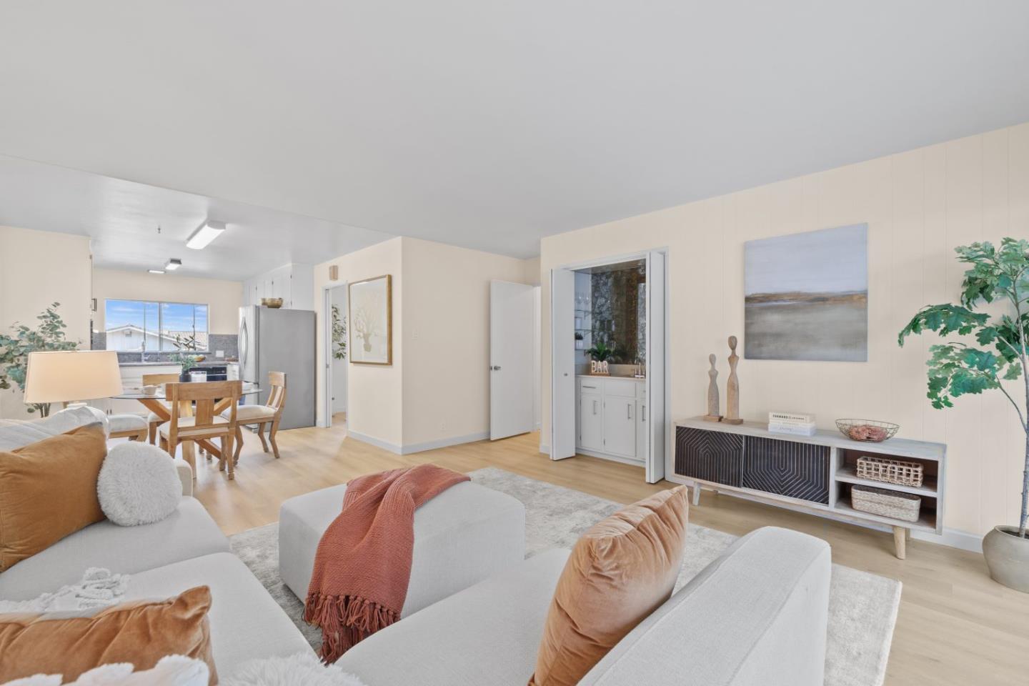 1250 Tuolumne Road Millbrae, CA 94030 - Photo 19 of 56 a spacious bedroom with a bed a table and chair