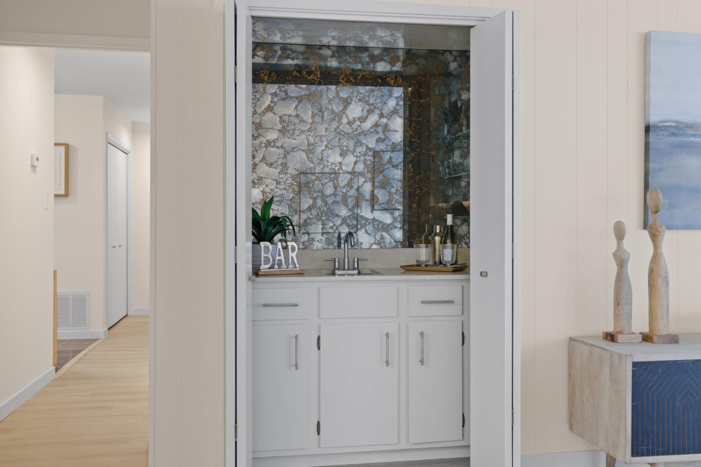1250 Tuolumne Road Millbrae, CA 94030 - Photo 21 of 56 a bathroom with a granite countertop sink a mirror and shower
