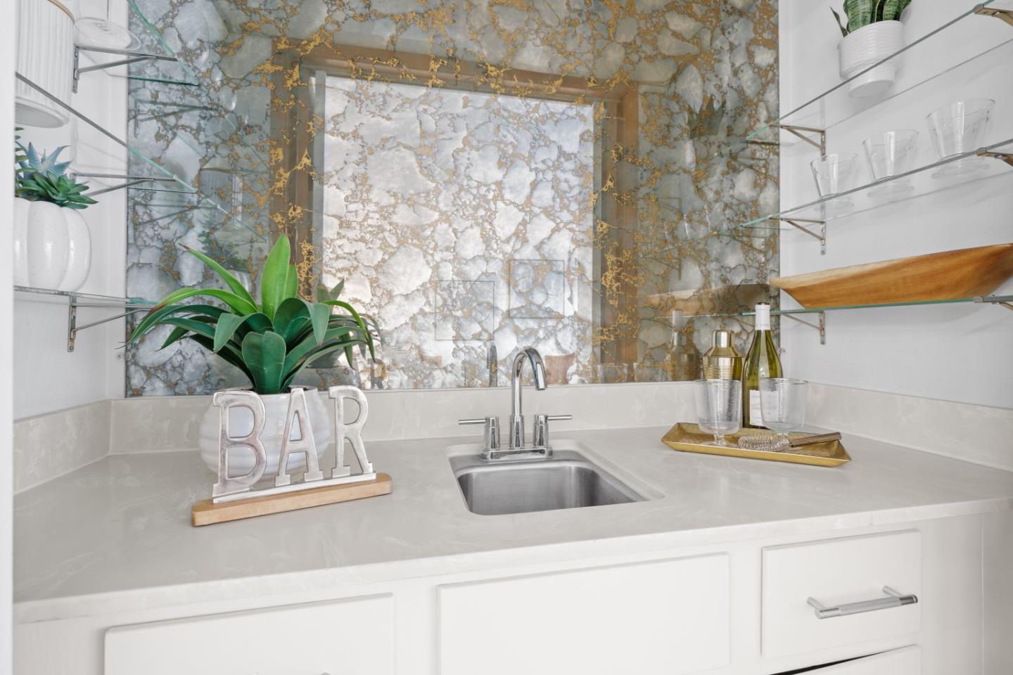 1250 Tuolumne Road Millbrae, CA 94030 - Photo 22 of 56 a closeup of a sink with a potted plant on it