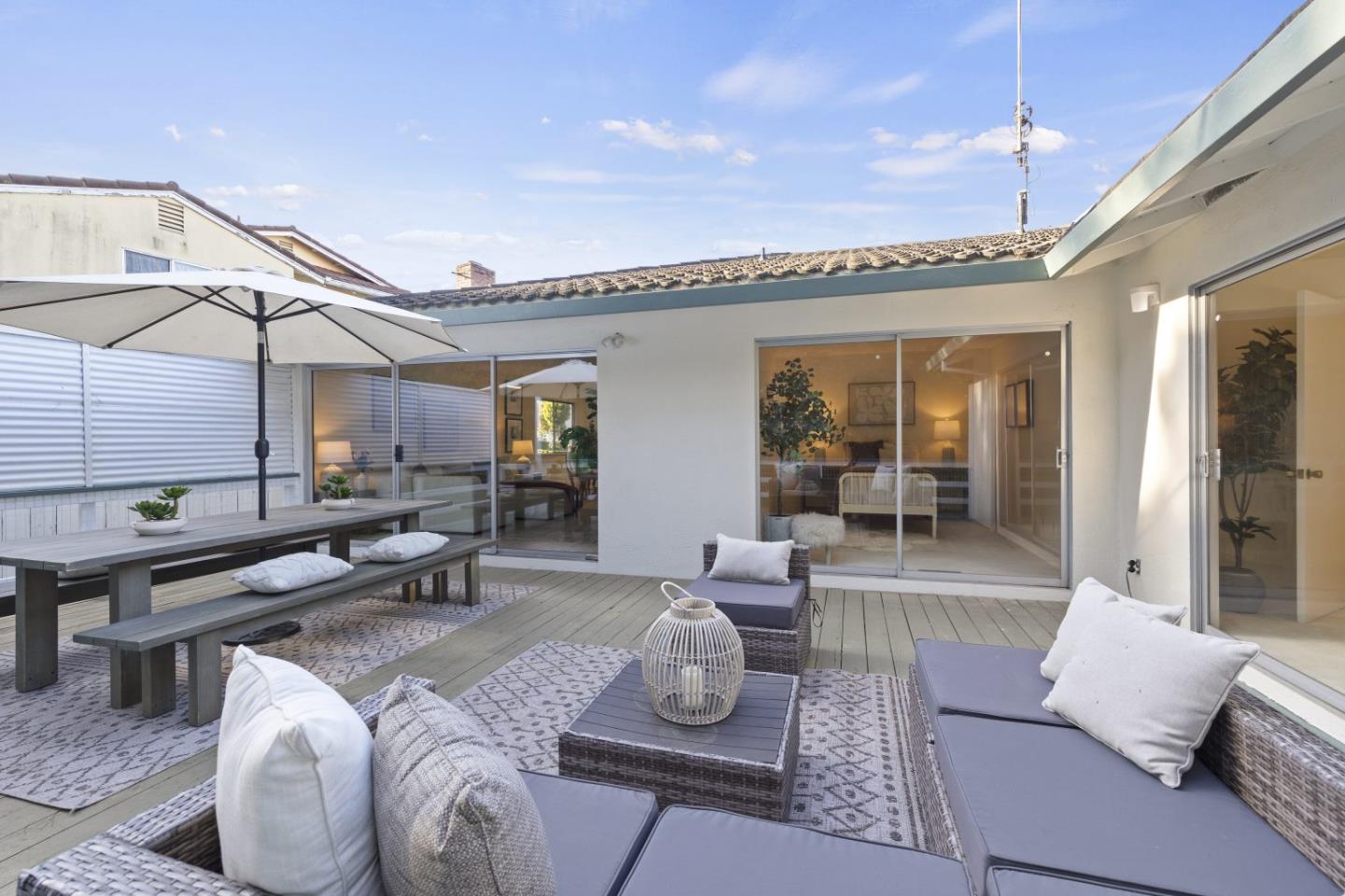 1250 Tuolumne Road Millbrae, CA 94030 - Photo 25 of 56 a living room with furniture and wooden floor