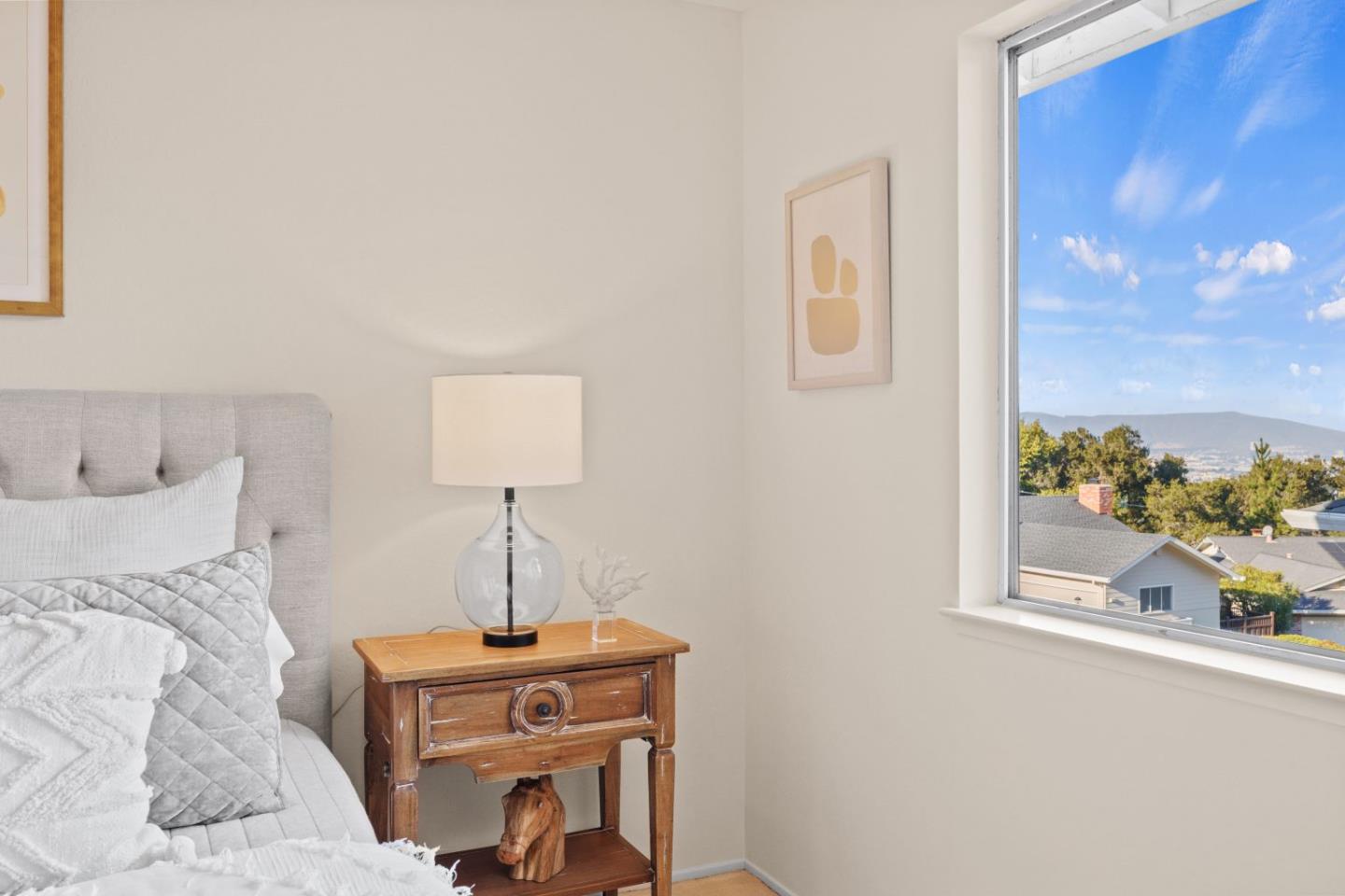 1250 Tuolumne Road Millbrae, CA 94030 - Photo 28 of 56 a bedroom with a bed and a window