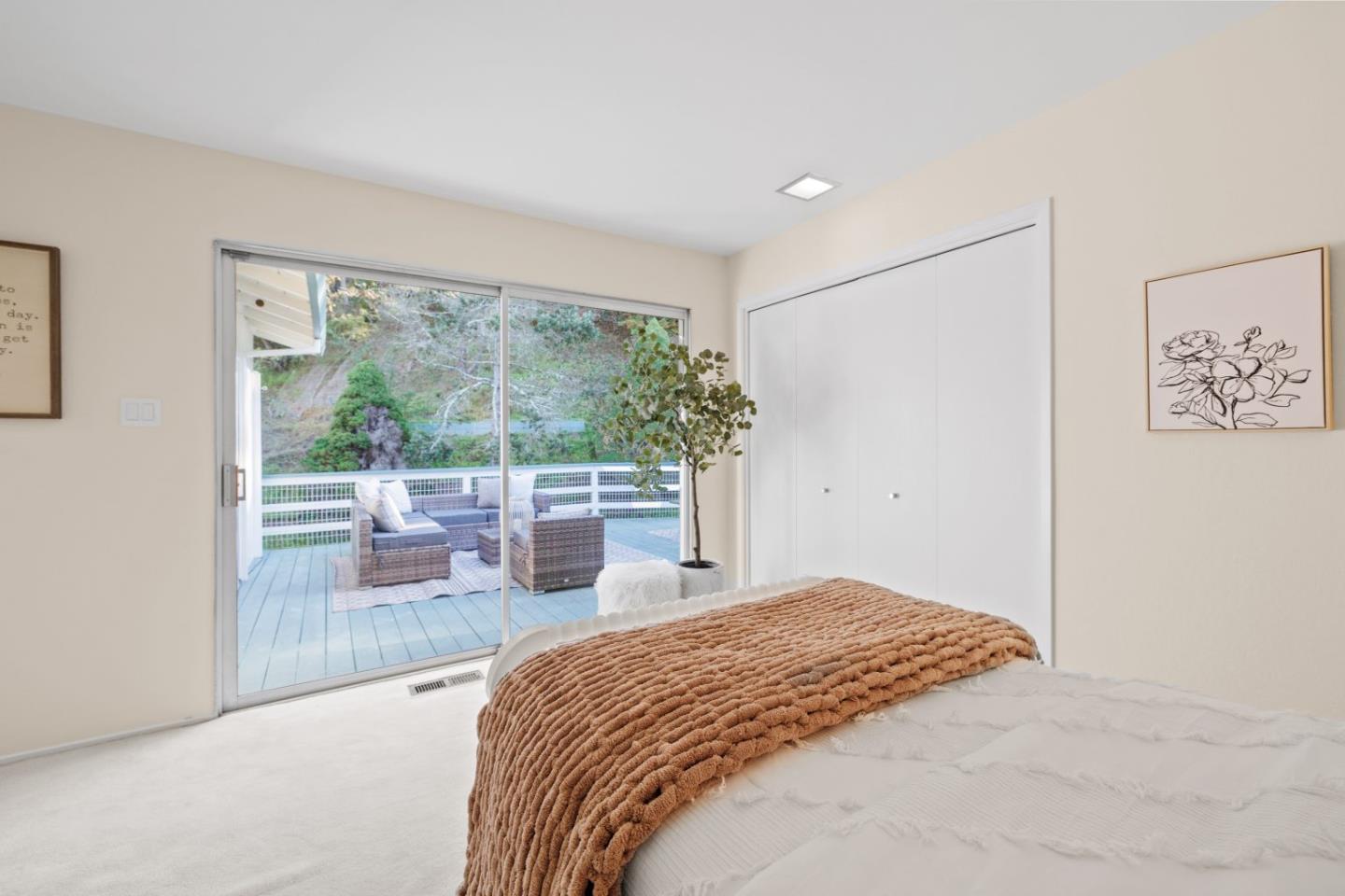 1250 Tuolumne Road Millbrae, CA 94030 - Photo 30 of 56 a bedroom with a large bed and a large window