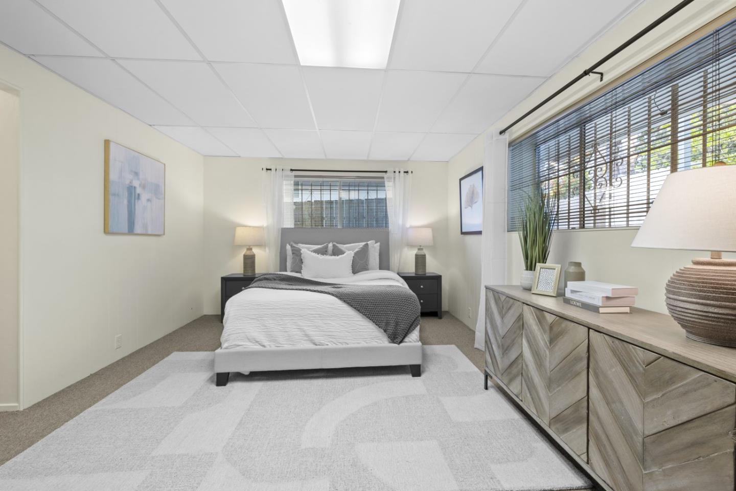 1250 Tuolumne Road Millbrae, CA 94030 - Photo 38 of 56 a bedroom with a bed and window