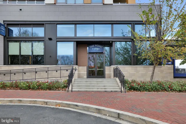 a view of outdoor space and yard in front of the house