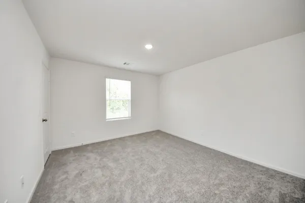 an empty room with an entryway