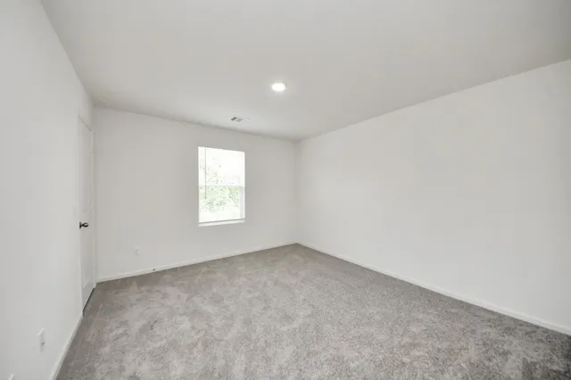 an empty room with an entryway